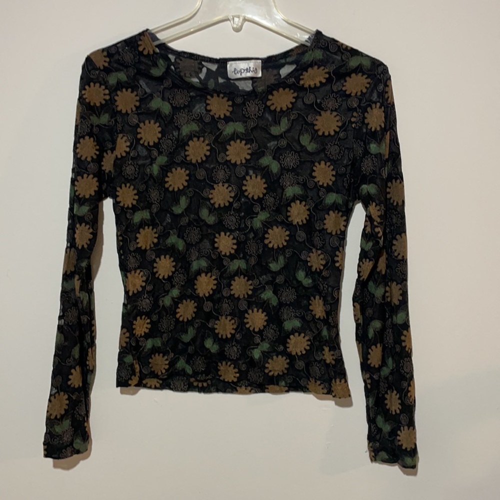 Top this sheer shirt